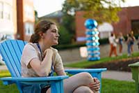 student sitting outside