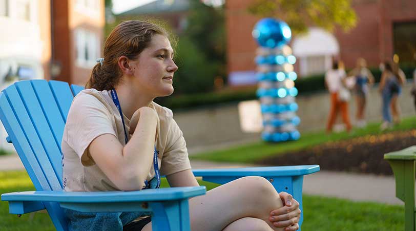 student sitting outside