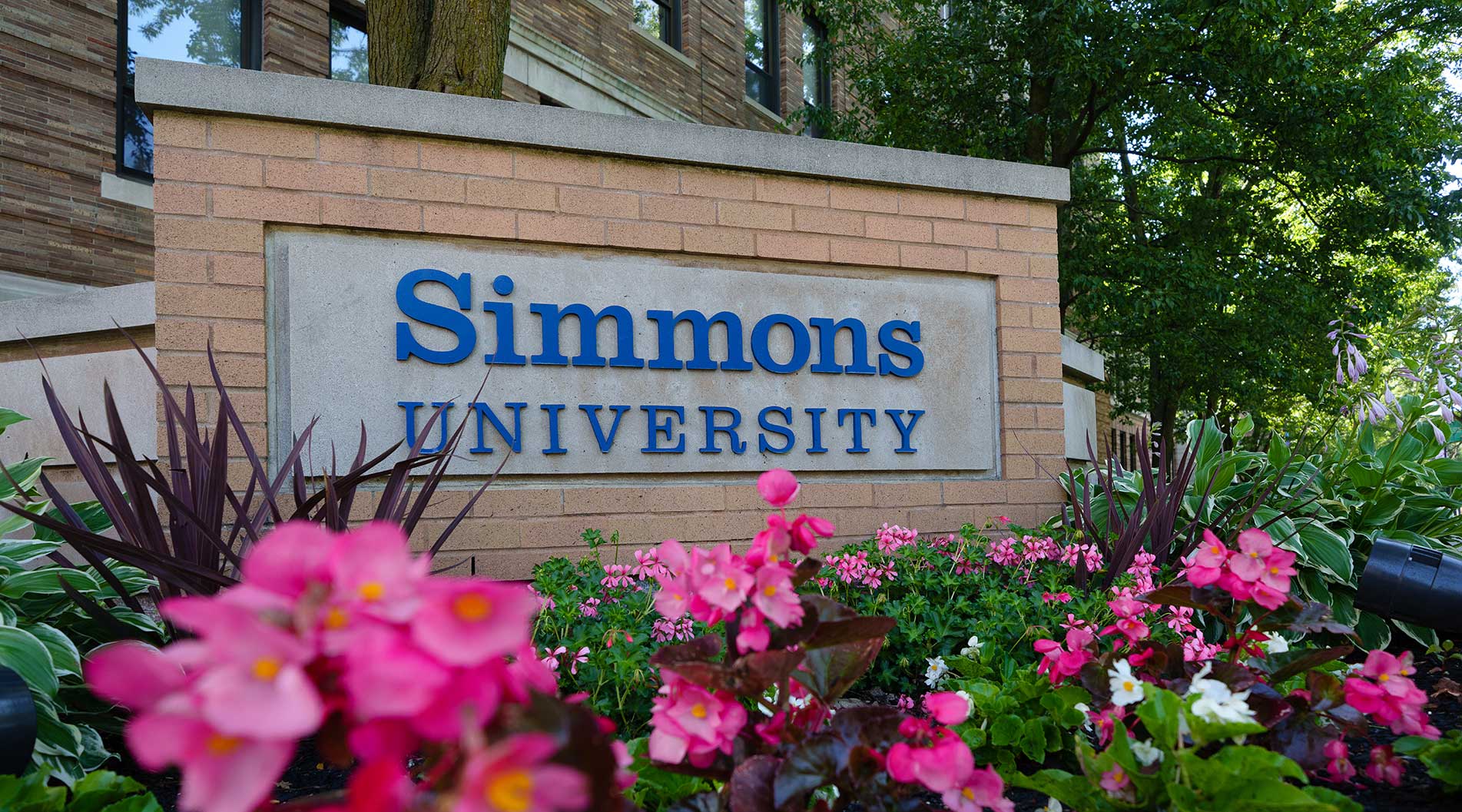 Simmons university sign with flowers 